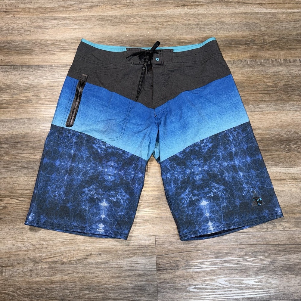 Pelagic Pinacol Stack Board Shorts Mens 36 Blue Black Geometric Water Pattern